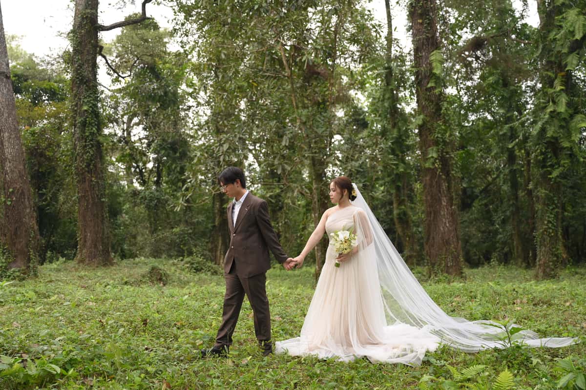 Couple walking in forest